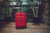 The Crown Collection Red Roller Luggage